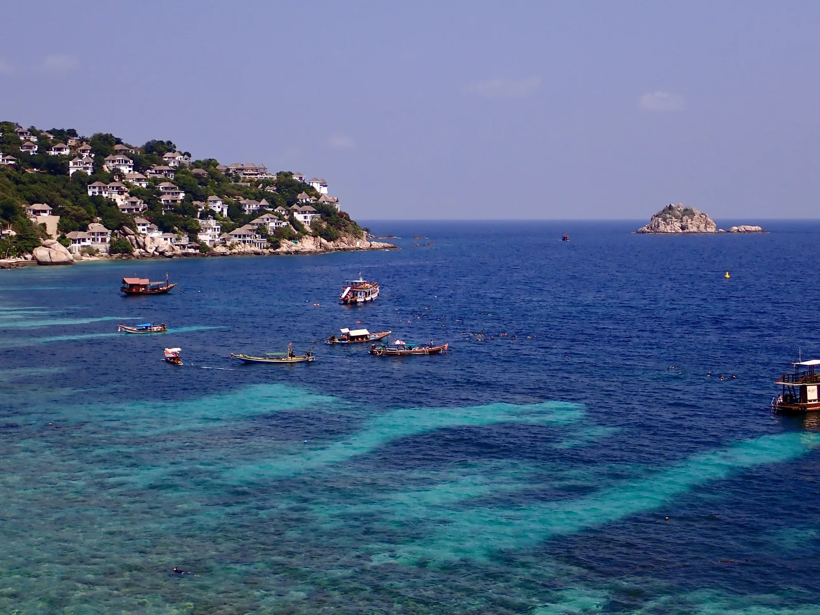 a turquoise blue bay in Shark Bay on Koh Tao Thailand