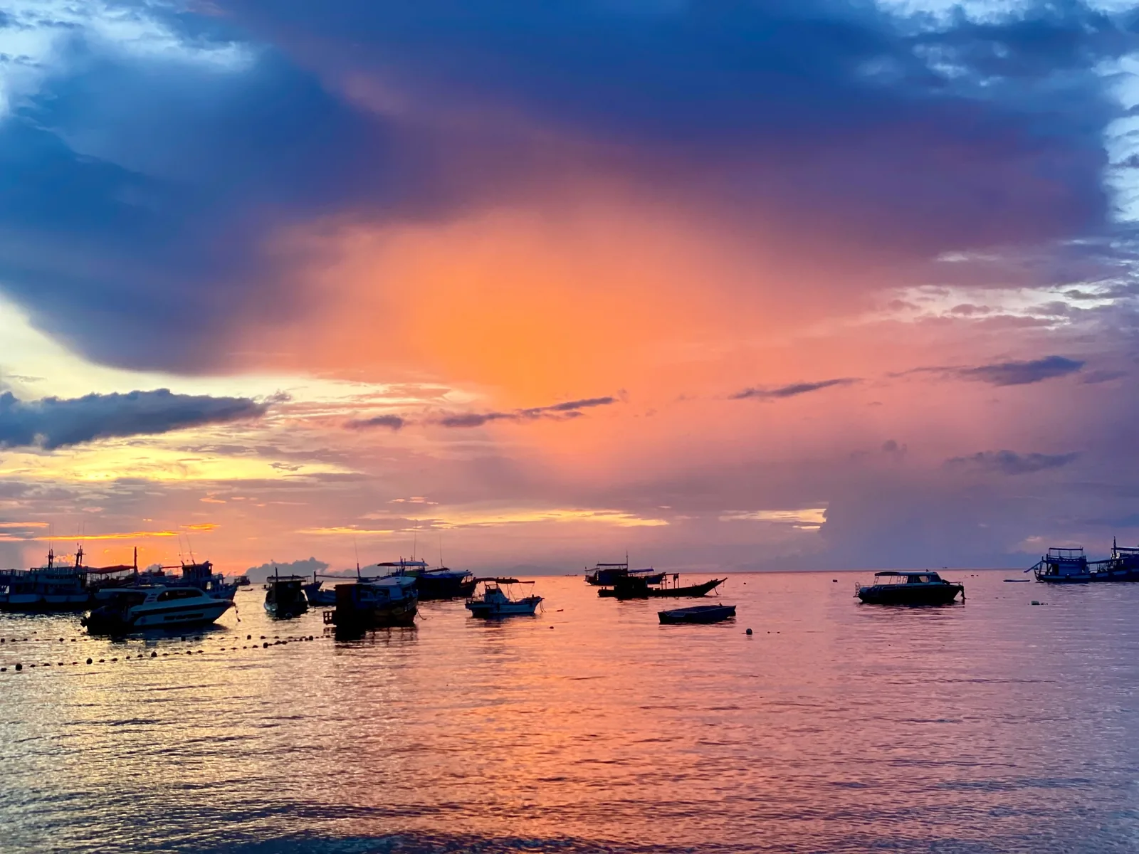 A colorful sunset on the beach in Koh Tao